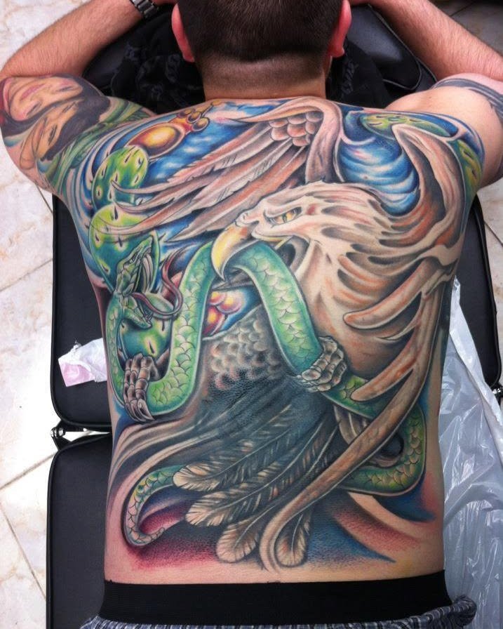 Full colour back piece tattoo covering the whole back